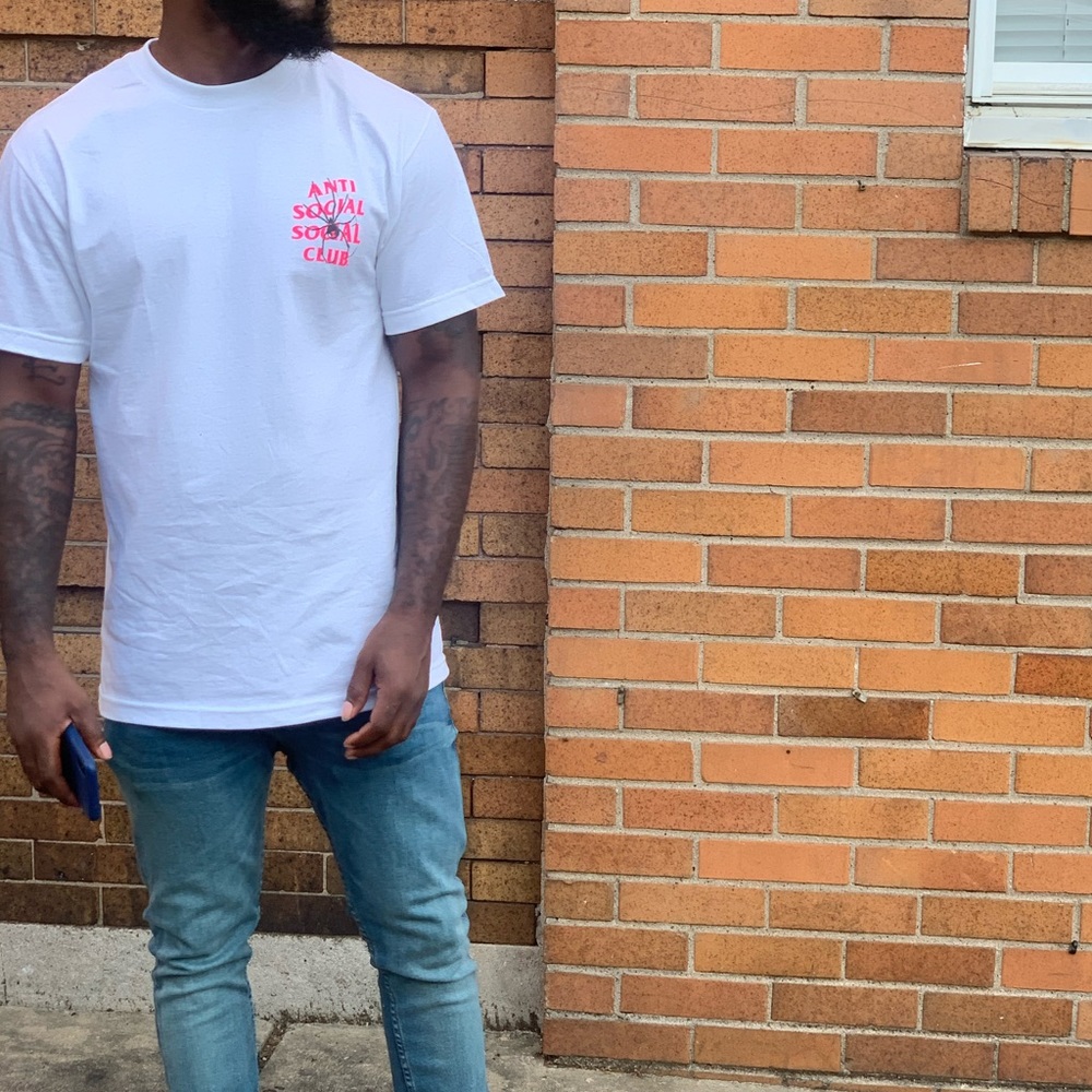I am selling a Anti Social Social Club Shirt with dark pink letters .